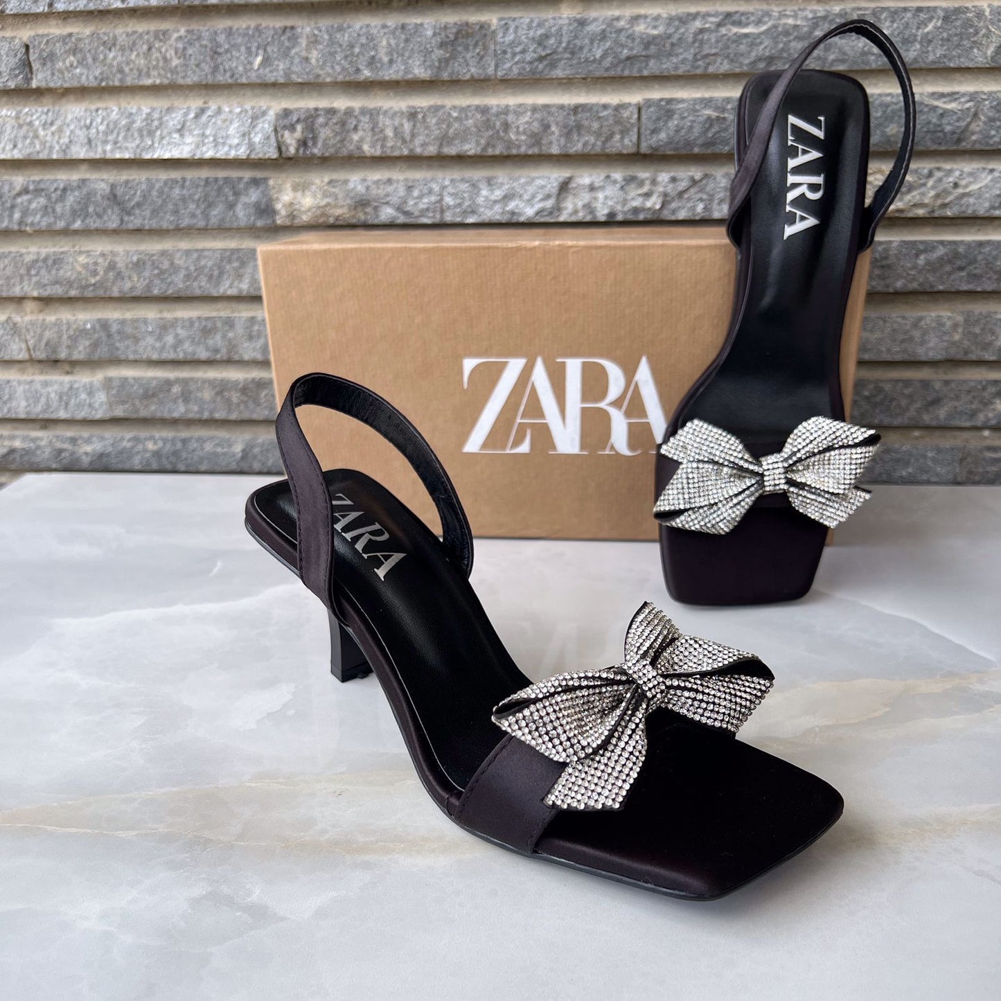 HEELED VINYL SANDALS WITH BOW